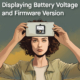 Woman holding up a voltage meter with the caption "Displaying battery voltage and firmware version"